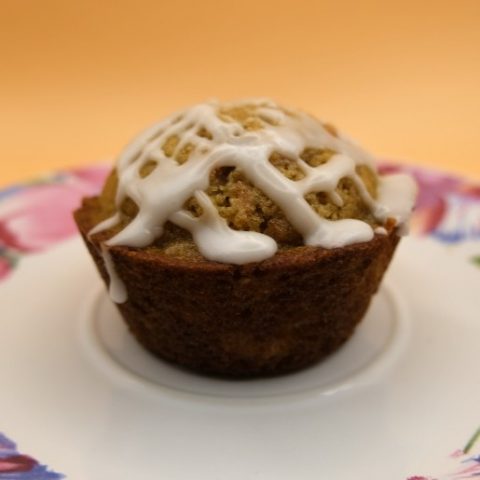 one carrot muffin on a floral plate
