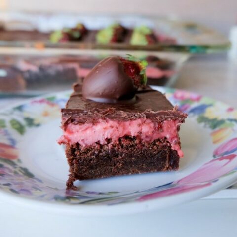 chocolate strawberry brownie on a floral plate